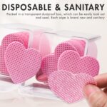 A clear plastic box containing 200 pink heart-shaped lint-free wipes, suitable for lash extensions and nail polish removal.