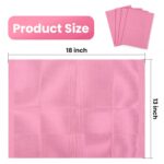 A stack of pink Etercycle disposable nail mats with one unfolded to show its absorbent surface and waterproof backing, ready