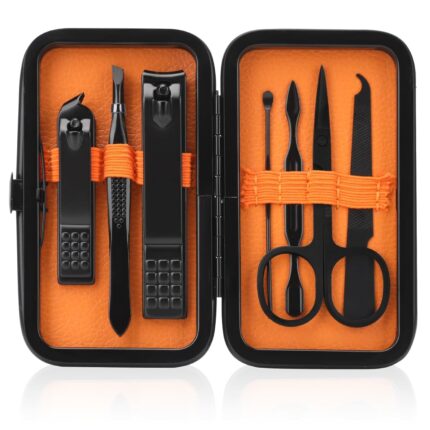 Open black and orange fenlebeneil 7-piece manicure set with nail clippers, scissors, tweezers, and other grooming tools displ
