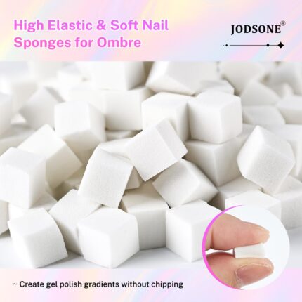 Close-up of JODSONE soft latex nail sponges and a stainless steel grabber pen, arranged for gradient nail art.