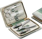 An open MR.GREEN 8-in-1 manicure and pedicure set, showcasing all eight stainless steel tools neatly arranged in a green PU l