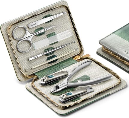 An open MR.GREEN 8-in-1 manicure and pedicure set, showcasing all eight stainless steel tools neatly arranged in a green PU l