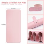 Pink microfiber PU leather nail art table mat rolled up with a strap, next to the mat unrolled showing its texture.